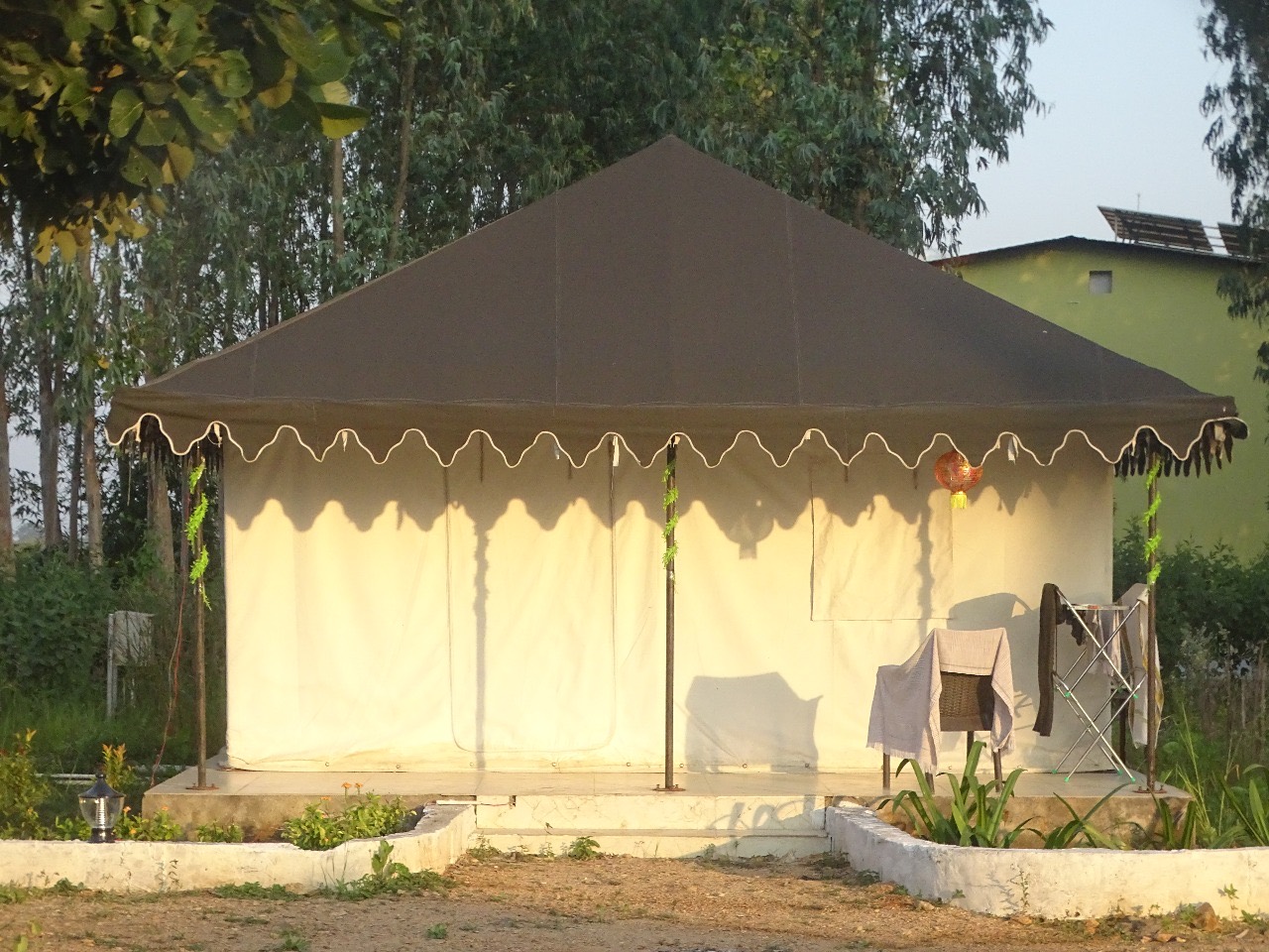 Resort cottages amid greenery at City Flora Tiger Resort